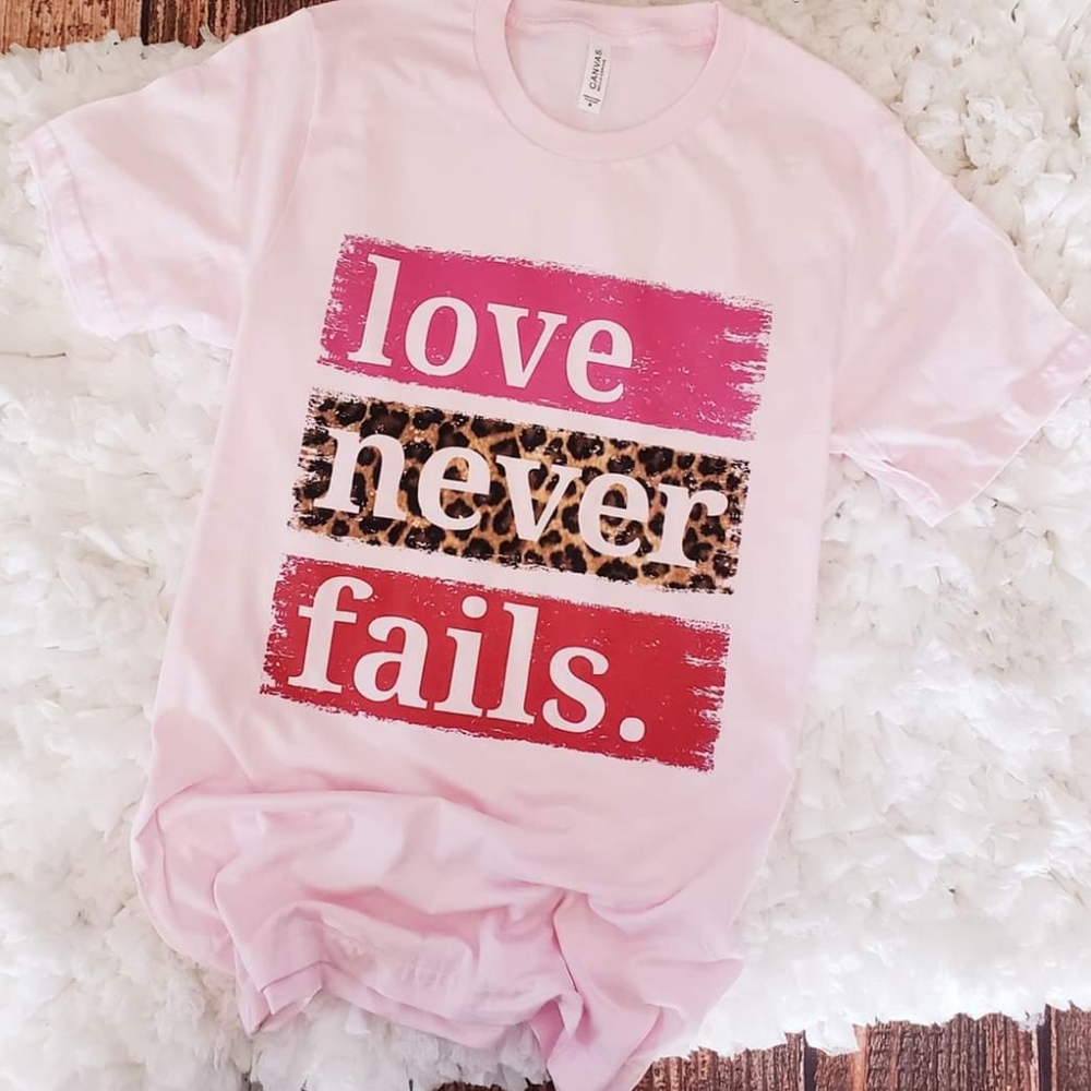 Love Never Fails Top